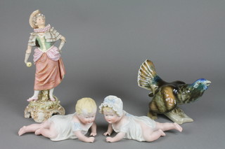 A pair of 19th Century German bisque figures of crawling babies 6" and minor decorative china