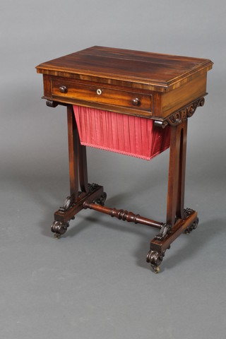 A William IV rectangular rosewood card table work table, the swivel top baize lined, the base fitted 1 long drawer above 1 deep basket, raised on standard end supports with H framed stretcher, scroll feet 29"h x 21"w x 15"d 