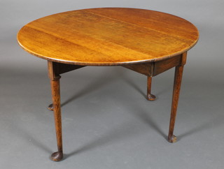 A 19th Century light oak oval drop flap dining table, raised on pad feet 28"h x 16 1/2"l when closed by 45"l when extended, (1 of the pad feet is missing) 