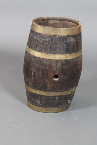 An elm and brass oval coopered barrel stick stand, 25"h x 12"w x 9"d 
