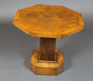 An Art Deco figured walnut octagonal occasional table with crossbanded top raised on square column and chamfered base 21 1/2"h x 24"w x 24"d 