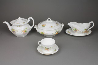 A Coalport Wenlock Fruit tea and dinner service comprising teapot, milk jug, sugar bowl and lid, 6 tea cups, 6 saucers, 5 two handled bowls, 6 saucers, a tureen and cover, a tureen, a sauce boat and stand, 5 dinner plates, 6 dessert plates and 6 side plates 