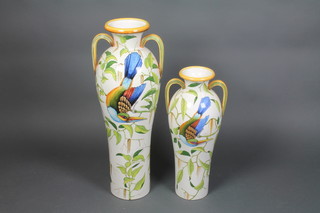A 20th Century Italian Majolica oviform vase with twin handles depicting an exotic bird amongst foliage 32", a smaller ditto 24"