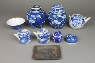 A near pair of blue and white prunus ginger jars and covers (f), minor Japanese teaware