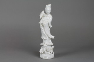 A blanc de chine figure of Guan Yin on a raised base 13" (f)