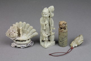 A soapstone desk seal with shi shi finial 2 1/2" and 4 other soapstone carvings