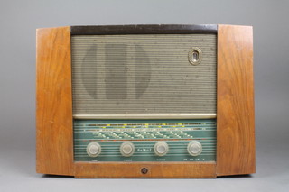 A Pye radio contained in a walnut case 