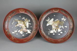 A pair of 19th Century Japanese circular lacquered chargers inlaid hardstone figures of eagles 17 1/2" (some damage)