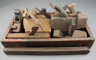 A collection of various 19th Century and later moulding planes etc