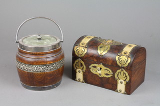 A Victorian walnut and brass banded dome shaped twin compartment tea caddy 5" x 8" x 4 1/2" and a cylindrical turned oak and silver plated mounted biscuit barrel 6" 