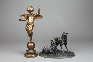 A bronzed figure of a standing cherub 12" together with a bronze figure group of 2 dogs raised on an oval base 5"h x 9"w