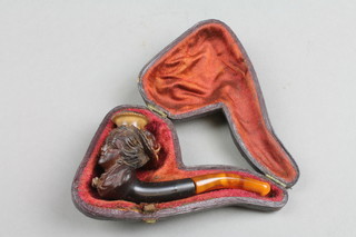 A cheroot holder in the form of a bonneted lady 2", cased