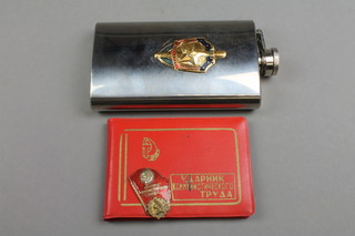 A Soviet Russian metal and enamelled hip flask together with a Soviet Russian pass 