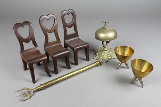 3 19th Century oak miniature dolls house chairs with heart shaped backs 6", a brass table bell, 2 trench art ashtrays and a telescopic candlestick 