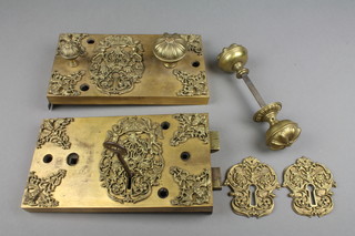 An Empire style gilt metal door lock plate, the escutcheon with crowns cipher 5" x 18 1/2" the bolt marked Gibbson W6AM AT0D together with 2 gilt metal escutcheons 3 1/2" 