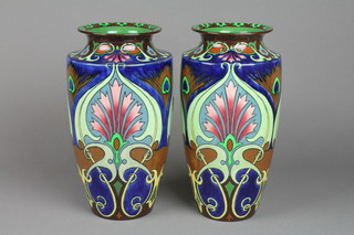 A pair of Shelley Intarsio oviform vases, the geometric decoration with stylised peacock feathers and floral motifs no.3634 10" 