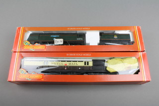 A Hornby OO gauge model locomotive R.74 BR Battle of Britain Class 41 Squadron together with a R440 GWR operating mail coach set, boxed