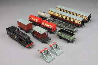 A Hornby British Railways tank engine together with a small collection of various rolling stock 