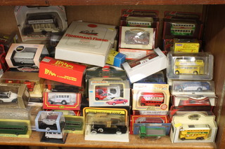 A large collection of various model buses