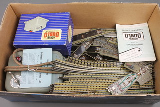 A Hornby OO C3 controller together with a power unit A3 and various items of track