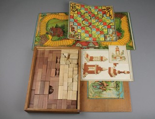 A childs wooden building block set, a Chad Valley motoring game and a Snakes & Ladders board 