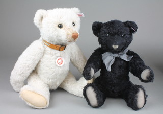 A Steiff 2008 black Pesty bear 12" with certificate and box and a limited edition Steiff Bastian The Nostalgia bear 14", with certificate and boxed