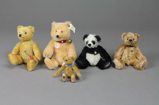 A Steiff yellow teddybear 6", a Hermann Panda 2005 5", ditto teddybear 2006 and 1 other Hermann bear 6", a small brown bear with articulated limbs 3"