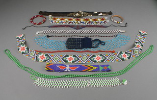 A collection of various American Indian bead work including bangles, trim etc