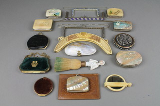 6 purses formed from shells, 5 other purses, a small leather wallet, 4 evening bag mounts, a small hand mirror, a dressing table brush with porcelain handle in the form of a bonneted lady 
