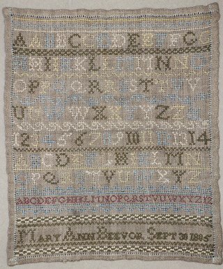 An 19th Century woolwork sampler by Mary Ann Beevor? September 30th 1805 with alphabet and numbers 9" x 7 1/2"