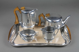 A 5 piece Picquot Ware tea service comprising twin handled tray, teapot hot water jug, milk jug and sugar bowl  