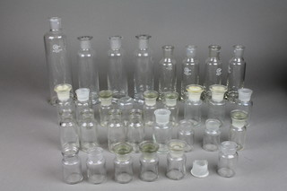 A collection of various chemistry specimen vases 