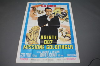 James Bond, an Italian James Bond Agent 007 Mission Gold Finger colour poster, marked Prima Edizione, Italian 1964 55" x 39", some fold creases 