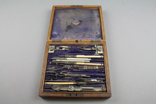 Adie, a geometry set contained in an oak case 