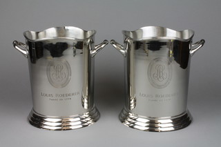 A pair of silver plated Louis Roederer champagne coolers with twin handles
