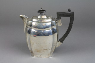 A silver hot water pot with ebony mounts Birmingham 1913, approx. 470 grams gross