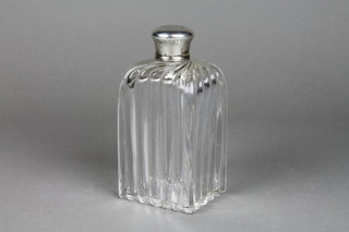 A Victorian silver mounted toilet bottle with chased crest, London 1836, 6 1/2"