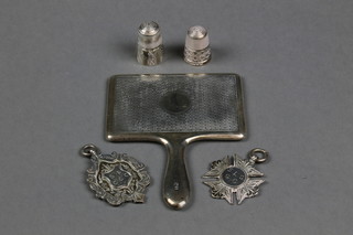 An engine turned silver miniature hand mirror, Birmingham 1925, 3", 2 silver sports fobs and 2 thimbles