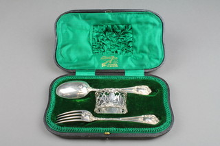 An Edwardian cased silver 3 piece christening set comprising fork, spoon and napkin ring, London 1909/1910, approx 138 grams