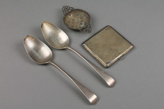 A pair of Georgian silver Old English table spoons London 1797, a silver cigarette case and a ditto tea strainer, approx. 229 grams