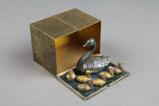 Stuart Devlin, a silver, silver gilt and enamel Twelve Years of Christmas Surprise Box - Seven Swans A-Swimming, enclosed in a silver gilt box with ribbon festoon, limited edition figure no.76/100, boxed, London 1976, approx 434 grams