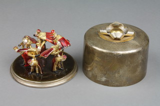 Stuart Devlin, a silver, silver gilt and enamel Twelve Years of Christmas Surprise Box - Ten Lords A-Leaping, enclosed under a silver domed lid with ribbon festoon, limited edition no. 76/100, boxed, London 1979, approx. 392 grams 