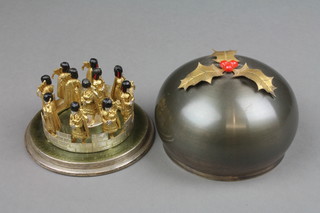 Stuart Devlin, a silver, silver gilt and enamel Twelve Years of Christmas Surprise Box - Eleven Pipers Piping, enclosed under a silver domed lid with holly and holly leaf finial, limited edition no. 76/100, boxed, London 1980, approx. 338 grams