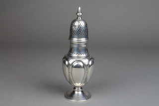A Victorian silver plated repousse sugar shaker 8"