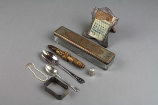 A silver engine turned napkin ring, a ditto calendar, spoon and minor items