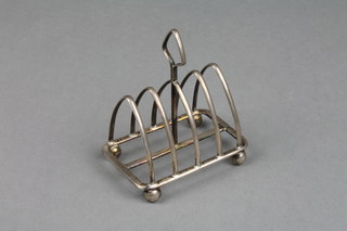 A miniature silver 5 bar toast rack, London 1934, approx 38 grams