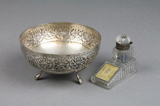 A foreign white metal bowl on claw feet 4" and a moulded glass inkwell