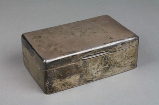 A rectangular silver cigarette box 5.5", London 1920