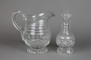 A cut glass baluster jug on spread foot 9", a ditto spirit decanter 7"