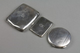 A silver match sleeve, Birmingham 1924, a compact and vesta 